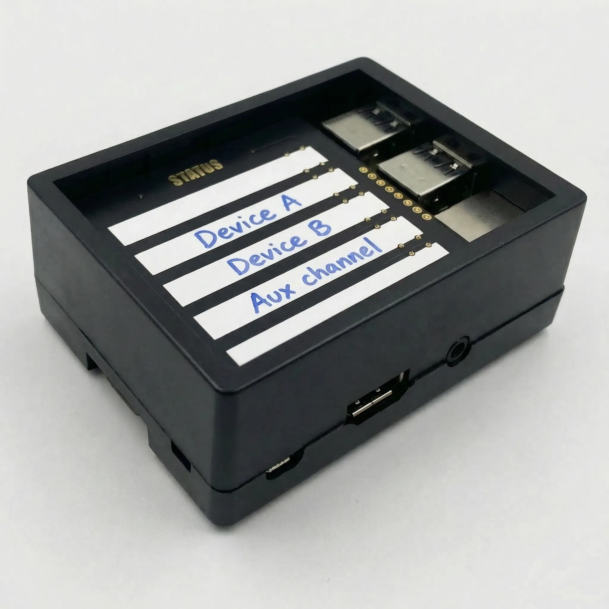 Status box after cleanup — Raspberry Pi, status board, and LED strips packed into an off-the-shelf enclosure