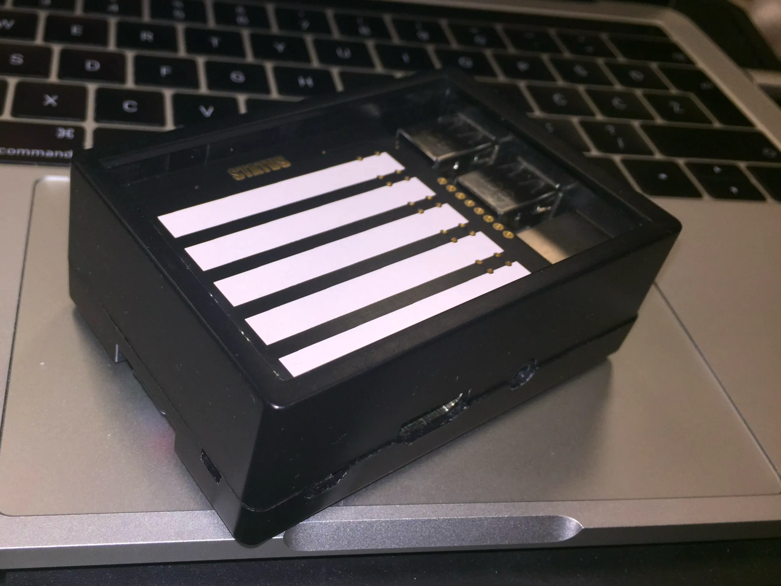 Raised status board inside the case